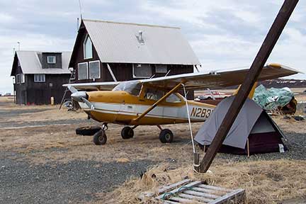 Airplane and camp at Clark's Point.