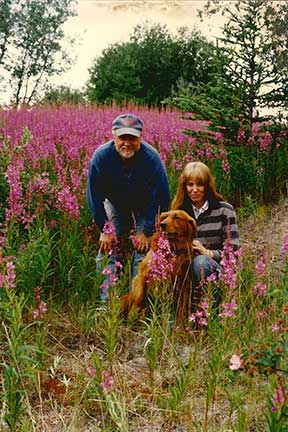 Dennis, Susan and Goldie in fireweed.